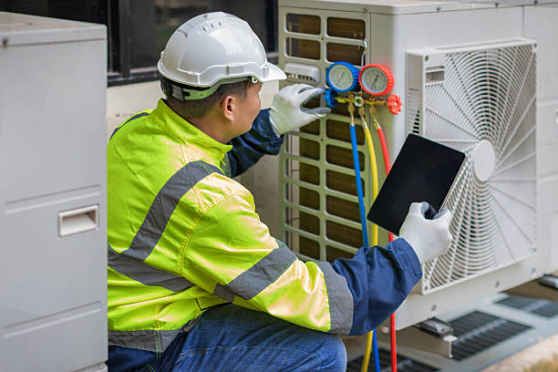 Professional Heat Pump Repair technician working in Allendale, MI